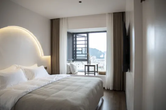 Liupanshui Nan Feng She Homestay (Liupanshui High-Speed Railway Station People's Square) - 2 stjerner
