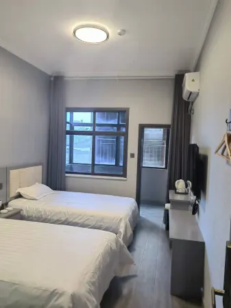 Ruixiang Hotel Отели в г. Синьань