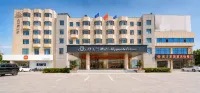 Magnolia Business Hotel (Yantai Longkou Heping Road Branch)