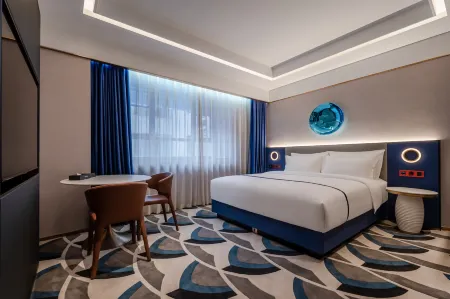 Fontoo Hotel Kunshan Huaqiao Отели рядом с достопримечательностью «TIANFU WETLANDS»