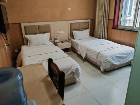 Jingxian Hongxing Hotel Отели рядом с достопримечательностью «Dongzi Park»