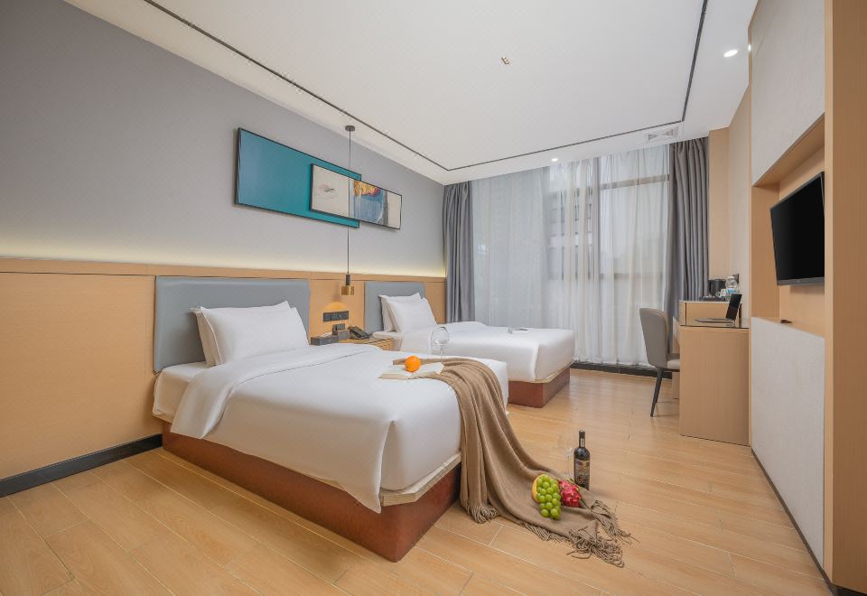 Yiju Hotel (Yingtan Kaixiang Central Plaza)(缤果逸居酒店（鹰潭凯翔新天地火车站店）) 호텔 - 잉탄 호텔 가격, 후기 2024 | 트립닷컴