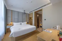 Shanghai Lanshu Smart Hotel (Jinshan City Beach Branch) Отели рядом с достопримечательностью «Куэнчэн (Шанхайский магазин Jinshaan Bai Lian)»