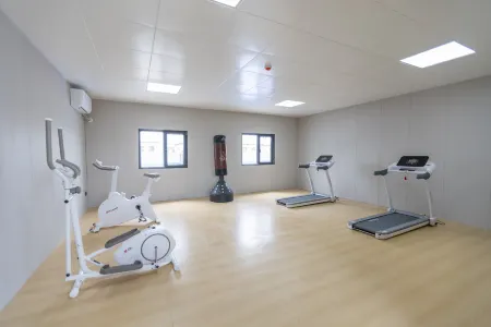 Urban Garden Hotel (Tumxuk Passenger Station) Отели в г. Тумшук