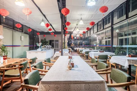 Yaju Hotel Отели рядом с достопримечательностью «Mifengyan Viewing Point»