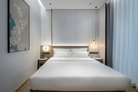 Huali Jiahe Hotel (Beijing Ping'anli Subway Station Branch) Отели рядом с достопримечательностью «Beijing Zhuanta Lane»