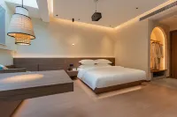 Enshi Tonghui Xiyuan Homestay - Bares