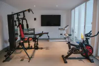 Sanya Xingye sea view design B & B - salle de sport