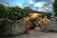 都江堰聽風喃溫泉度假民宿（都江堰高鐵站店） 鄰近文創桂林民間藝術村的酒店