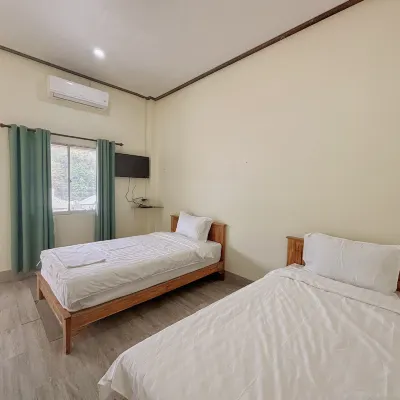 GuChuan Guesthouse Hoteles en Ban Xiang-Nouak
