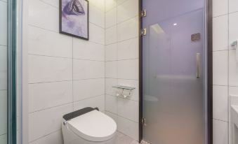 Magnolia Business Hotel ( Dalian Jinzhou Hengda Garden)