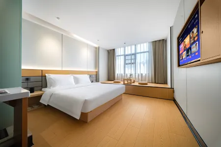 Manzhou Hotel (Pingjiang Bus Station Outlet)