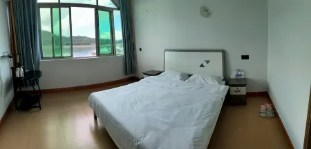 Jiaomei Bay Tidal Fisherman's House Homestay Отели рядом с достопримечательностью «Triton Bay»