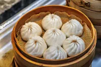 Huashuyi Hotel (Huzhou Zhili Wuyue Plaza China Children's Wear City) - فطور