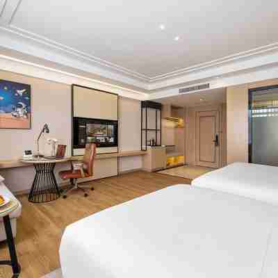 Vienna International Hotel (Baoshan High-speed Railway Station Wuyue Plaza) Rooms