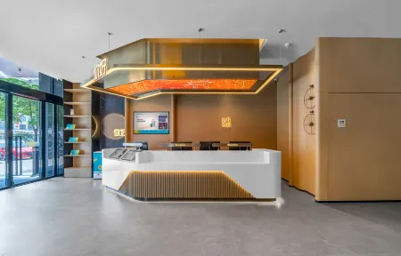 Ni Hao Hotel (Xiantao Sibao Road Fuyoubaojianyuan) Отели в г. Сяньтао