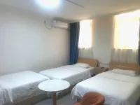 Oulu Liangshe Hotel (Zhanqiao Railway Station)
