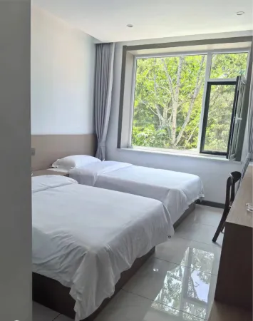 Hedongwan Wellness Homestay Отели рядом с достопримечательностью «Jiulongdong Sceneic Area»