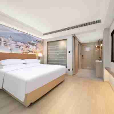 維也納酒店（荊州古城長江大學店） Rooms