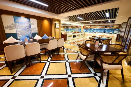 Huahan Hotel Отели рядом с достопримечательностью «Qingdao Institute of Technology»