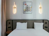 Aparthotel Adagio Paris Opéra Hotels near Auber Station