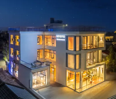 Xuwen Jiaoweixiang Haiqinwan Homestay