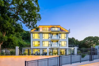 Xiwan Courtyard View Leisure Resort Villa Meishu (Zhoushan Zhujiajian Store) Отели рядом с достопримечательностью «Тай Циншань»