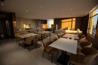 Huixian Hualong Lido Fashion Hotel (Times Square)