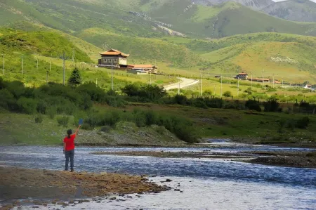 Muya Fengqi Ranch Отели рядом с достопримечательностью «Quanhua Shoal»