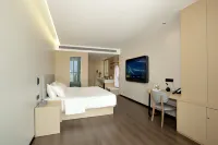 Home UP Huayi Collection Hotel (Khorgas National Gate Scenic Area) - Kolam Renang