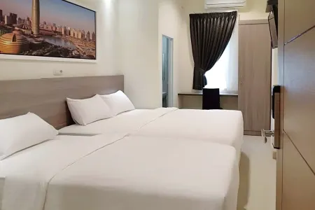 TwoSpaces Living at Maximus Inn Отели в г. Sei Selayur