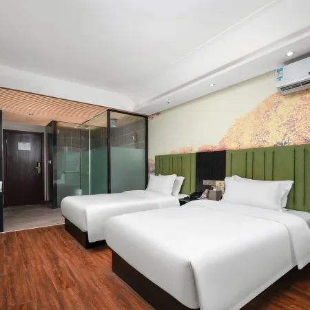 Huayiju Hotel (Xinzheng Xias International College Xueyuan Road) Отели рядом с достопримечательностью «Народная больница Синьцзяна»