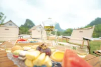 Guanglv Le Xing Zhi Qu De Tian Border Camp Homestay - فطور