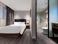 Muzi Xuanxuan Hotel (Wuxi Huaqing Bridge Subway Station People's Hospital) Hotels near Yangming Station