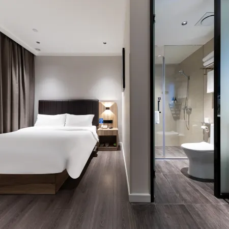Muzi Xuanxuan Hotel (Wuxi Huaqing Bridge Subway Station People's Hospital)