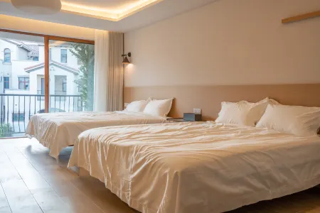 According to the sea pick up light | luxury in quality, cream tone log wind Art holiday villa Отели рядом с достопримечательностью «Xiamen University - Jiahe College»