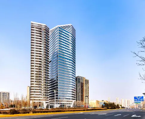 Light Chengtao Hotel (Harbin Songxi Yintai City) - Apartments