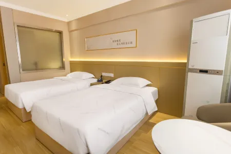 Yashiman Hotel (Chibi Guomao Branch) Отели рядом с достопримечательностью «Lushui Lake Scenic Spot»