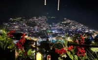 Luanxi Yunshu Garden Homestay (Xijiang Qianhu Miao Village Observation Deck Zhuzhuan Coffee Shop)
