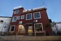 Shenzhen Xihe Nuanju Homestay (Yangmeikeng Judiaosha) Hotels near Qiniang Mountain