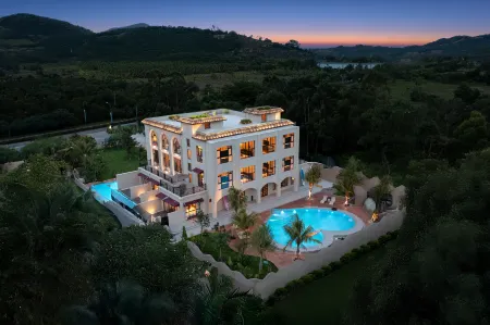 Floral Fanchenli Homestay (Wanning Shimei Bay Shenzhou Station) Отели рядом с достопримечательностью «Zhouzai Island»