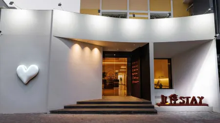 Qieting Stay Homestay Отели рядом с достопримечательностью «Harbin Huaxia Institute of Computer Technology (Qianshan Road)»