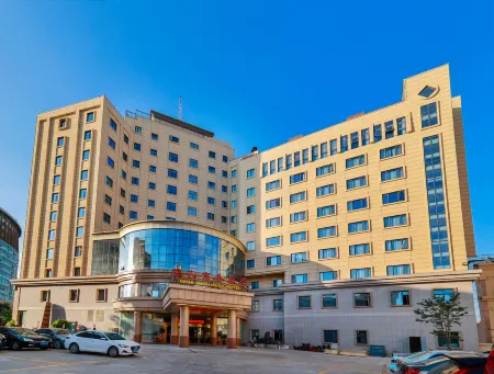 Dehe Business Hotel Quanzhou Quangang Branch Отели рядом с достопримечательностью «Quangang Botanical Garden»