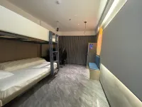 Kumamoto E-sports Hotel (Queshan Jingyu Plaza) Hotels in Queshan