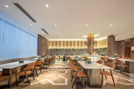 Jingman Qingya Hotel (Shangqiu Station City Government Branch) Отели рядом с достопримечательностью «Jinshiji Square»