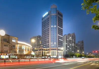 LanOuShangPin Hotel (Kunshan City Government) Отели рядом с достопримечательностью «Куньшань Торговый Билдинг (Северный Военно-Мэйн)»