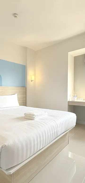 ห้องสแตนดาร์ด เตียงใหญ่ 1 เตียง มีระเบียง