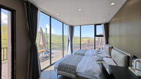 Xinyuan Sanshan Homestay (Xinyuan Nalati Airport)