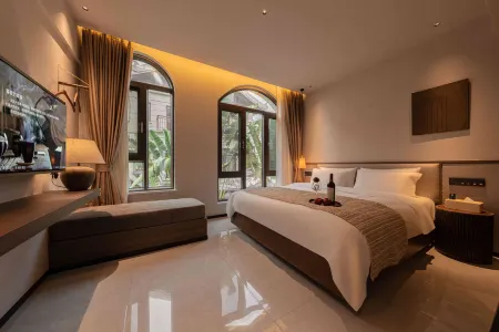 Xishuangbanna Jinghong Yakatu Theme Inn (Mengle Dafo Temple)