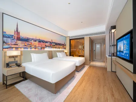 Vienna International Hotel (Shaoguan High-speed Railway Station Square Branch) Отели в г. Шаогуань